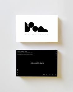 two black and white business cards on top of each other with the logo for joe mathews