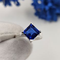 Item Description :- Material - Pure 925 Solid Sterling Silver Gemstone - Blue Sapphire (Lab Created) Gemstone Shape - Square  Gemstone Size - 7x7 mm  Ring Weight - 3 Gram Approx. Ring Size - 5 to 16 US  Shipping : Free Standard Shipping Worldwide Payment Policy :- We accept payment through PayPal. All payments must be made within 7 days of purchase. If you are experiencing some difficulty in paying through PayPal and need additional time, please  contact us. Shipping Policy :- All United States Blue Solitaire Lab-created Sapphire Rings, Blue Crystal Ring With Prong Setting, Princess Cut Sapphire Ring With Prong Setting As Gift, Solitaire Sapphire Cubic Zirconia Ring, Fine Jewelry Sapphire Crystal Ring With Prong Setting, Sapphire Solitaire Cubic Zirconia Ring, Sapphire Solitaire Ring In Cubic Zirconia, Sapphire Solitaire Ring With Cubic Zirconia, Solitaire Lab-created Sapphire Ring Gift