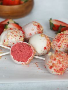 some strawberries and other food on a plate