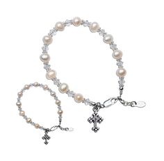 "This is a timeless keepsake bracelet set designed and hand-beaded in the USA.  This is made using only the finest materials such as 100% sterling silver components, freshwater pearls, high-end crystals, sparkling silver accents, and intricate cross charms.  This makes a treasured gift for mother and daughter with a reminder of the special bond they share.  This comes in a beautiful  gift box and makes a great Mother's Day Gift!  Mother's bracelet measures 7 - 7.5\" and all bracelets have adjust Elegant 8mm Beads Jewelry For Baptism, Elegant Beaded Jewelry For Baptism, Adjustable Pearl Bracelets For Baptism, Adjustable Pearl Bracelet With Round Beads For First Communion, Adjustable Rosary Bracelet With Round Beads For Baptism, Classic Adjustable Jewelry For First Communion, Adjustable 8mm Beads Rosary Bracelet For Baptism, Adjustable Round Beads Jewelry For First Communion, Elegant Adjustable Beaded Bracelets For Baptism