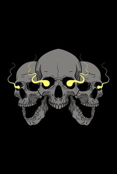 a skull with yellow eyes on a black background