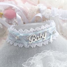 ♡ International shipping usually takes 2-3 weeks to arrive ----------------------- Baby tag white lace baby blue bow rhinestone bling choker necklace , kawaii cute day collar jewelry tie back ♡ Measurement ♡ width 3.2cm ♡ Length 30cm + satie back tie Cute White Jewelry With Ribbon, Handmade Blue Kawaii Jewelry, Adjustable Blue Choker, Unique Adjustable Blue Choker, Blue Bow Necklace, Kawaii Choker, Bling Choker, Blue Kawaii Doll Collar Dress, Bow Choker