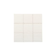 a white tile wall with squares in the middle and one square at the top, on an off - white background