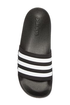 The iconic Adidas 3 stripe logo lines these causal shower slides. Whole sizes only, for 1/2 sizes, order next size up Manmade upper and sole Adidas Black Slides With Logo, Black Adidas Slides For Summer, Adidas Adilette, Logo Line, Pool Slides, Slide Sandals, Fashion Casual, Nordstrom Rack, Slides