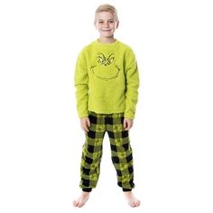 Dr.Seuss and the classic story, How GRINCH Stole Christmas, started as an inspiring children's tale and is now one of the most beloved holiday shows around! Now you can get matching Grinch pajamas for the whole family. We all know someone who has a little Grinch in them around the holidays, and perhaps all year long! Well, this is the perfect Grinch pajama set for an entire family of Grinches. For the men, women, and kids you have a 2-piece pajama set. The top is a Faux-Shearling Big Face crewne Matching Christmas Pajamas Family Grinch, The Grinch Who Stole Christmas, Grinch Pajamas, Dr Seuss The Grinch, Grinch Who Stole Christmas, Family Pajama Sets, Matching Christmas Pajamas, Kickee Pants, Matching Family Pajamas