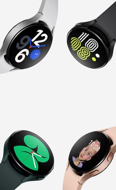 four smart watches with different designs and colors on their faces, all showing the same time