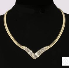 Description: Discover a stunning piece of vintage jewelry with this diamond gold necklace. The intricate design features diamonds set in 14K yellow gold, making it a timeless and elegant addition to any jewelry collection. Specifications: Metal: 14K yellow gold Weight: 51.58g Main stone: Diamonds Style: Vintage Clasp: Box clasp with safety catch Length: 17 inches Pendant dimensions: 1.5 inches x 1 inch Item Code: 889408 Elegant Gold Rhinestone Necklace For Formal Occasions, Gold Diamond Necklace For Evening With Single Cut Diamonds, Vintage Gold Diamond Necklaces, Gold Luxury Rhinestone Necklace For Formal Occasions, Luxury Gold Rhinestone Necklace For Formal Occasions, Elegant Gold Necklace With Cubic Zirconia, Elegant Gold Cubic Zirconia Necklace, Vintage Gold Diamond Necklace For Formal Occasions, Vintage Yellow Gold Diamond Necklace For Formal Occasions