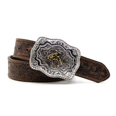 Product Details: Kids’ tooled belt Two-tone buckin’ bronc buckle Brown Belt width: 1 1/4" 100% full-grain leather Buckle finish: Antique gold and silver Due to the uniqueness and natural attributes of this leather, color variations may occur Adjustable Engraved Brown Belt, Leather Belt Buckles For Rodeo, Western Belt Buckles For Rodeo, Western Concho Belt Buckles For Western-themed Events, Southwestern Concho Belt Buckles For Ranch, Western Leather Belt Buckles For Rodeo, Leather Concho Belt Buckles For Rodeo, Western Gold Belt With Antique Buckle, Western Concho Belts For Ranch