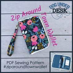 the zippered pouch is made from fabric and has flowers on it, along with an additional