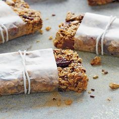 granola bars wrapped in white paper on a table