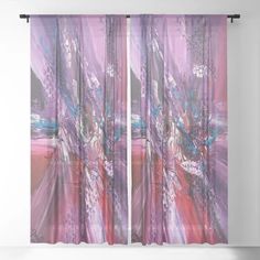 an abstract painting with pink, purple and blue colors is hanging on a wall in front of a window