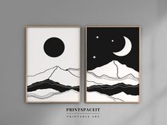 two black and white prints with mountains, stars and the moon above them on a wall