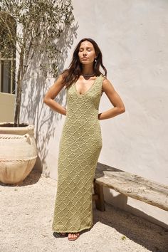 Escape to tropical paradise in our Exotic Escape Knit Maxi Dress in Green. a luxurious blend of comfort and style. Whether you're wandering through the vibrant markets of Marrakech or lounging in a hammock on the shores of Phuket. let this dress be your chic companion for all your exotic adventures. Maxi dress. true to size V neckline Exposed back with tie Knit overlay Lined 75% Polyester 25% Acrylic Slight stretch Please refer to the care label on garment for specific instructions on how to care for it Model wears XS Length from shoulder to hem: 137cm on an S Chest 41cm. Waist 36cm. size S Knit Beachwear Dresses For Vacation, Knit Beach Dress For Beach Season, Knit Maxi Dress For Vacation, Knit Maxi Length Dress For Vacation, Knit Summer Vacation Dresses, Summer Knit Maxi Dress For Vacation, Knit Maxi Dress For Summer Vacation, Summer Knit Maxi Dress, Bohemian Knit Dresses For Beach Season