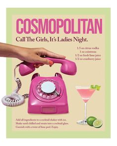 a pink telephone sitting on top of a table next to a martini and a lime