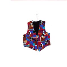 "cutest vintage!  90s geometric PARTY PRINT VEST. so unique and one of a kind... wearable art! perfect for adding style to any occasion. tag:  fabric: 100% cotton  size:   (see measurements below chest: 24\" (multiply by 2) length: 26\" measured from back collar seam all sizes vary from company to company, so to guarantee a proper fit please read the measurements carefully and compare them to a similar garment of your own. i do not accept returns, unless items are damaged or grossly misrepresented, so please make sure the measurements are correct for you :) (vesr) . . . . . . . . . . . . . . . . . . . . . . . . . . . . . . . . . . . . . . . . . . . . . . . . . . . . . . . . . . . . . . . . . . . . . . . . . . . . . . . . . . ." Vintage Patchwork Sleeveless Top, 90s Sleeveless Vest For Fall, Vintage Sleeveless Patchwork Top, Retro Multicolor Cotton Vest, Retro Patchwork Vest For Fall, Vintage Patchwork Vest For Summer, Retro Multicolor Sleeveless Vest, Retro Multicolor Summer Vest, Multicolor Retro Summer Vest