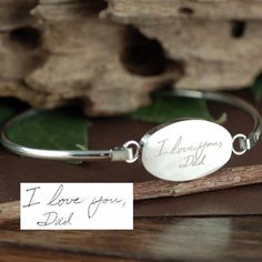 Actual Handwriting Bangle Bracelet, Silver Handwriting Jewelry, Personalized Engraved Bracelet, Memorial Bracelet, Gift for Her, Sympathy Gift This laser engraved Stainless Steel bangle bracelet is a perfect gift for your Mom, Best Friend or Bridesmaids! or anyone you choose! Personalized with actual handwriting. This is engraved into high quality heavy gauge stainless steel. Engravable Portion: 15mm x 24mm METAL COLOR OPTIONS: ROSE GOLD, SILVER, GOLD Stainless Steel does NOT tarnish. How to ord Bar Necklace Layered, Portrait Jewelry, Mom Best Friend, Handwriting Bracelet, Handwriting Necklace, Engraved Bar Necklace, Handwriting Jewelry, Signature Bracelet, Memorial Bracelet