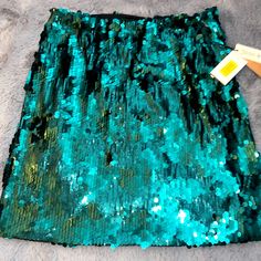 Gorgeous Skirt! Great For A Holiday Party Blue Fitted Skirt For Party Season, Fitted Blue Mini Skirt For Party Season, Blue Fitted Mini Skirt For Party Season, Blue Mini Skirt For Party Season, Blue Sequined Skirt For Spring, Blue Sequined Mini Skirt For Spring, Blue Fitted Sequin Skirt, Teal Sequin Skirt, Glamorous Blue Sequined Skirt