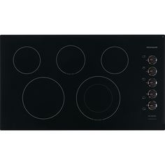 an electric stove with four burners and knobs