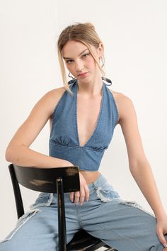 Our Denim Halter Top gives you an ultra-flattering look you'll love. It features a plunging neckline, soft denim fabric, and back smocking for a great fit. The perfect end to any summer outfit. Denim Halter Top, Top Jean, Backless Halter Top, Plunging Neckline, Denim Fabric, Summer Outfit, Smocking