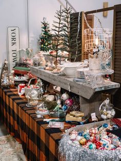 an assortment of christmas decorations on display in a store