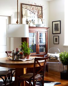 the dining room table is surrounded by chairs