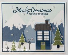 a christmas card with a house and trees