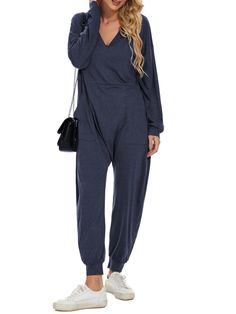 When it comes to being comfortable, light and beautiful, Jumpsuits are the ideal garment for that relaxed and cool style that you want to project. It is versatile, easy and quick to combine, it stylizes the body and can be used by any woman of any age. This practical black jumpsuit is perfect for you, it will give you a unique casual style. Pockets on sides. Buttons down front closure. Pockets on front. Long sleeves. Deep V-neckline 30% cotton, 65% polyester, 5% spandex. Color may be lighter or darker depending of the device it is displayed. High Heel Wedges Platform, Espadrilles Sneakers, Beautiful Jumpsuits, Chanel #1, Visor Sunglasses, Loose Jumpsuit, Romper And Jacket, High Heel Wedges, Wide Pants