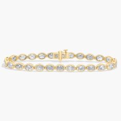 Timelessly luxurious and elegant, this classic tennis bracelet features 10 ct. tw. of diamonds shimmering along its length. The oval-cut stones are beautifully held in bezel settings in the lustrous 14k yellow gold design. Platinum Rose Gold, Engagement Rings Marquise, Gold Rings Fashion, Gold Pearl Necklace, Ladies Diamond Rings, Oval Cut Diamond, Yellow Gold Chain, Rose Gold Jewelry, Unique Gemstones