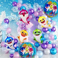 balloons and decorations for a baby shark birthday party