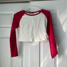 Long Sleeved Baseball Tee. Crop Top. Never Worn, Was Going To Use As A Halloween Costume But Never Ended Up Wearing It. Christmas Crop Top, White Color Block Long Sleeve Tops, White Long Sleeve Color Block Top, Fitted White Color Block Top, White Cotton Crop Top For Fall, Casual Crew Neck Crop Top With Color Block, Casual Color Block Crew Neck Crop Top, Red Long Sleeve Cotton Crop Top, Red Color Block Long Sleeve Top