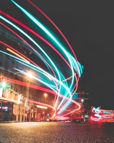 blurry photograph of city street at night