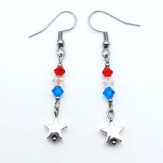 Handmade Patriotic July 4th Earrings With Hematite Stars And Red, White & Blue Glass And Celestial Crystal Bicone Beads. Made With Stainless Steel Findings. Approximate Length - 1 1/4" All Beaded Items (Jewelry And Keychains) Are Buy 2, Get 1 Free *Of Equal Or Lesser Value To The Highest Priced Item* With No Added Shipping. Simply Purchase 2 Beaded Items Of Your Choice And Let Me Know Which 3rd Product You Would Like For Free. Want Something Specific? Send Me A Message With A Custom Request And Blue Patriotic Earrings For Independence Day, Patriotic Blue Earrings For Independence Day, Patriotic Drop Earrings For 4th Of July, Patriotic Red Star-shaped Earrings, Silver Dangle Patriotic Earrings, Patriotic Silver Dangle Earrings, Patriotic Dangle Earrings For Independence Day, Patriotic Nickel-free Jewelry For 4th Of July, Nickel Free Dangle Jewelry For 4th Of July