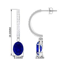 Product Details Linked to a bezel set moissanite is a 4-prong set created blue sapphire that draws the eye effortlessly in this stunning drop earring pair. The earring is studded with round moissanite on the hoops and is completed with hinged hoop closures. They can easily take you from day to night with their magical aura that never fails to amaze you. Product Information SKU SHP-EARRINGS112114410 Length 22.1 mm Width 5.8 mm Height 12 mm Weight 3.00 gm (Approximate) LAB CREATED BLUE SAPPHIRE IN Blue Sapphire Oval Diamond Earrings, Sapphire Hoop Earrings For Anniversary, Blue Sapphire Diamond Earrings Gia Certified, Blue Diamond Round Hoop Earrings, Blue Diamond Hoop Earrings, Anniversary Sapphire Hoop Earrings, Formal Blue Hoop Earrings With Prong Setting, Elegant Sapphire Hoop Earrings With Prong Setting, Sapphire Hoop Earrings With Prong Setting