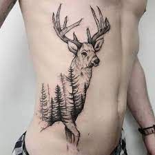 a man with a deer tattoo on his stomach