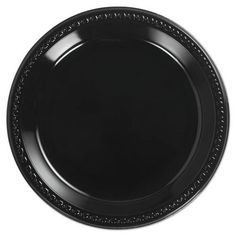 an empty black plate with beading on the rim