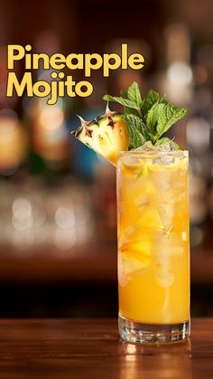 the pineapple mojito is served in a tall glass with mint garnish