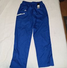 Brand: Adidas Style: Team Sports Woven Pants Color: Collegiate Royal Blue/ White Size: Small Has Zippers On The Legs, Drawstring At The Waist And Two Front Hand Pockets And One Pocket On The Right Leg. Nwt. No Box. Pet And Smoke Free Home Bin#234 Adidas Sportswear Pants With Moisture-wicking, Adidas Moisture-wicking Sportswear Pants, Adidas Sportswear Sweatpants With Pockets, Adidas Joggers For Sports, Adidas Cotton Gym Pants, Adidas Jogging Bottoms With Pockets, Adidas Joggers With Pockets For Sports, Adidas Stretch Moisture-wicking Pants, Adidas Sports Pants Full Length