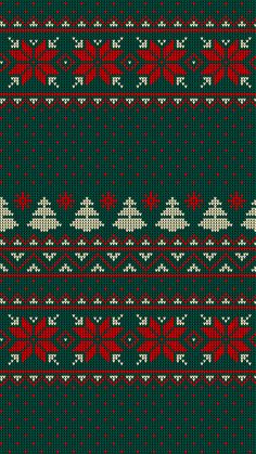 a red and green knitted christmas sweater with white snowflakes on it's sides