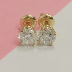 1.5 Carat Real Diamond Stunning Stud Earrings Gift for Women 14K Solid Gold. 1.5 Carat Studs, Real Diamond Studs, Stunning Gold Studs, Diamond Earrings Gift, Studs for Women, 14K Solid Gold Studs. SPECIFICATIONS Total Carat Weight: 1.50 Setting: 14K Yellow Gold Certificate: Yes Gold Weight: 0.97 Length: Appraised Value: 5999.00 MAIN STONE Gemstone: Diamond Carat Weight: 1.50 Cut: Excellent Shape: Round Color: D Clarity: SI2 Not Enhanced Comments: Free Shipping and Free Certificate with every ord Gold Diamond Earrings Stamped 14k For Anniversary, Gold Brilliant Cut Earrings For Anniversary, Gold Round Diamond Earrings For Anniversary, Anniversary Yellow Gold Cluster Earrings, Anniversary Yellow Gold Round Cut Cluster Earrings, 14k Stamped Diamond Earrings For Anniversary, Classic Diamond Earrings Stamped 14k, Yellow Gold Round Earrings For Anniversary, Gold Diamond Cut Earrings For Anniversary