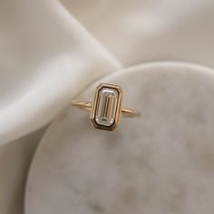 Dover – Olive Avenue Jewelry Olive Avenue, Olive Avenue Jewelry, Emerald Cut Moissanite, Forever One Moissanite, Step Cut, Engraved Items, Jewelry Companies, Moissanite Rings, Perfect Ring