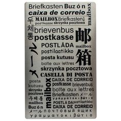 the back side of a metal plaque with words written in different languages and numbers on it