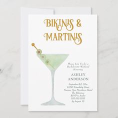 a white card with a martini glass on it