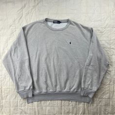 "Vintage 80s Polo Ralph Lauren French Terry Pony Sweatshirt Crewneck XL Gray V Size XL Good condition. Overall wear. Boxy fit. Measurements: Length: 27\" Pit to Pit: 29\" All items will be shipped with 2-3 business days from the purchase date. All items come from a smoke-free & fur-free household. Returns or exchanges are not accepted at this time. All sales are final. We are not responsible for any garments once they are shipped." Vintage Crew Neck Tops For Loungewear, Polo Crewneck, Gray Sweatshirt, Vintage Crewneck, Vintage Polo Ralph Lauren, Sweatshirt Crewneck, Polo Ralph Lauren Mens, Grey Sweatshirt, Ralph Lauren Men