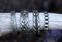 This listing is for ONE sterling silver stacking band. This thick sterling silver band features a beautiful and deeply engraved filigree pattern. Wear it alone or with other stacking rings. I love wearing my stacking set on my thumb to compliment other beautiful rings on my other fingers. The combinations are endless. Want the whole set? Buy it here: https://www.etsy.com/listing/493597787/sterling-silver-stacking-rings-sterling?ref=shop_home_active_1 -Choose your size at checkout! - Ring measure Silver Rings With Unique Variations For Anniversary, Silver Rings With Unique Designs For Anniversary, Silver Stamped Jewelry With Round Band, Stamped Silver Round Band Jewelry, Silver Stackable Jewelry, Silver Stackable Rings, Sterling Silver Stackable Rings, Silver Mens Ring, Silver Ring Band