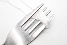 a fork with a rope on top of it