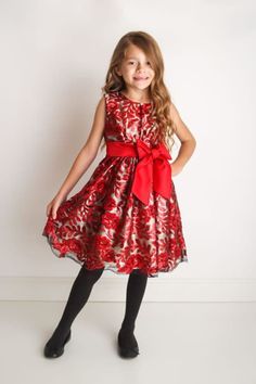 OUR DESIGN - THE BELLA DRESS This beautiful handmade dress will add a little magic to your little girl's special event! It's classy and sweet with a festive twist perfect for any event. This dress incorporates a floral pattern composed of red sequins in black tulle. The gown is tied together with a playful bow around the waist.  *Made up of satin, polyester, and nylon fabrics with sequins and embellishments *A ruffled skirt adds volume  *Handmade in the USA *A puffy skirt can be included as an add-on for only $10-$25 extra! * The listing is for the Bella dress only OUR PROMISE We only use the highest quality fabrics to handmade unique and memorable pieces for your little one. We design and create this piece with love and with attention to detailed.  *Please refer to our Q&A section before Red Sleeveless Dress For Fancy Dress, Red Sleeveless Dress For Fancy Occasions, Red Princess Dress For Dress-up, Elegant Red Princess Dress For Fancy Dress, Elegant Red Princess Dress For Fancy Dress Events, Christmas Red Princess Dress For Fancy Dress, Red Holiday Dress With Bow, Holiday Red Dresses With Red Bow, Red Holiday Dress With Red Bow