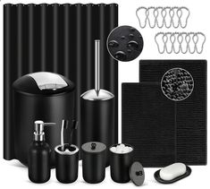 black bathroom accessories including soap dispenser, toothbrush holder and shower curtain