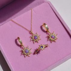 Discover our stunning Celestial Magic Opal Sun Jewelry Set, featuring a vintage gold ring, bracelet, necklace, and earrings adorned with opal sunstones. Add a touch of magic to your ensemble. Gold Purple Jewelry, Purple Gold Jewelry, Purple And Gold Jewelry, Disney Princess Jewelry, Purple Jewelry Set, Tangled Jewelry, Tangled Necklace, Sun Jewelry, Cuban Chain Bracelet