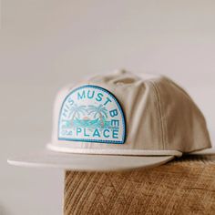 Mountains, Beach, or Desert? No matter what you choose, we know it's true: This Must Be The Place. Specs Style: 5-Panel Snapback Unisex Hat Brim: Flat Brim Materials: 100% Cotton Twill Fit: One Size Fits Most (probably even you Big Head Todd) Bonus: Stylish vent holes (so your head can breathe, duh) Origin: Imported **FREE SHIPPING Peach Shirt, Flat Brim Hat, Beach Adventure, Mountain Designs, Big Head, Coffee Branding, Beach Hat, Style Crush, Fit Check