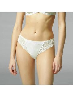 Simone Perele Wish Brief Panty 12B720 in ivory color - front Elegant Stretch Lace String, Elegant Stretch String Lace, Elegant Stretch Wedding Bottoms, Elegant Stretch Bottoms For Wedding, Feminine Fitted Bottoms With Contrast Lace, Feminine Cream Lace, Elegant Stretch Lace Briefs, Elegant Lace Bottoms With Lace Trim, Elegant String Fitted Bottoms